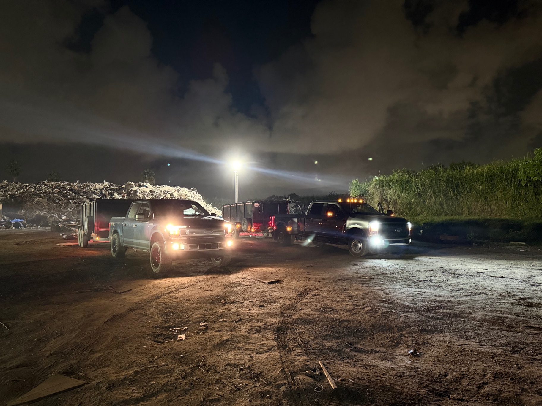 Two NextGen trucks working a large overnight cleanout